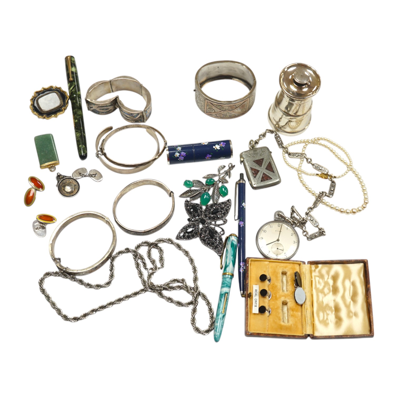 A mixed group of items including silver, white metal and costume jewellery, silver vesta case, silver mounted pepper mill, pens, Victorian mourning brooch, dress pocket watch, etc. Condition - poor to fair